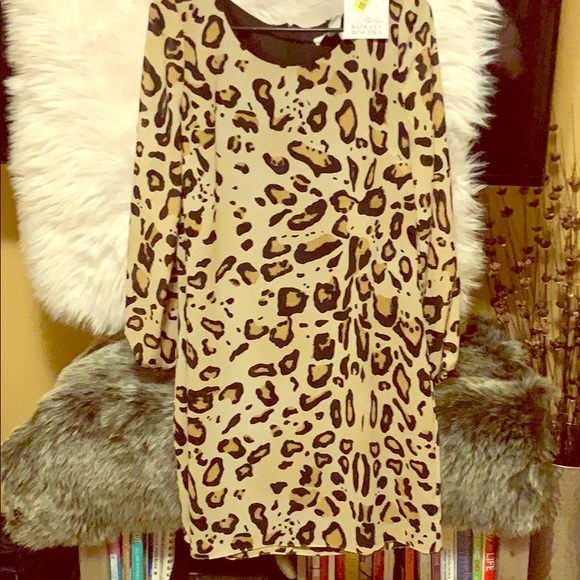 Badgley Mischka Dresses & Skirts - Never worn. Tags still in. Leopard pattern dress.
